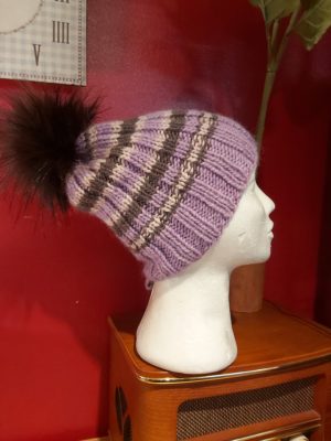 Knitted hat with tassel
